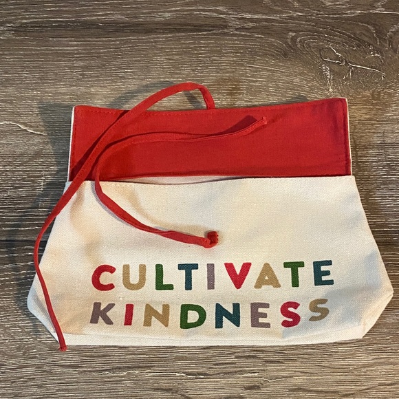 Clarins x FEED NWOT Cultivate Kindness Canvas Clutch with Red Accents 8.5x5.5 - Picture 3 of 5